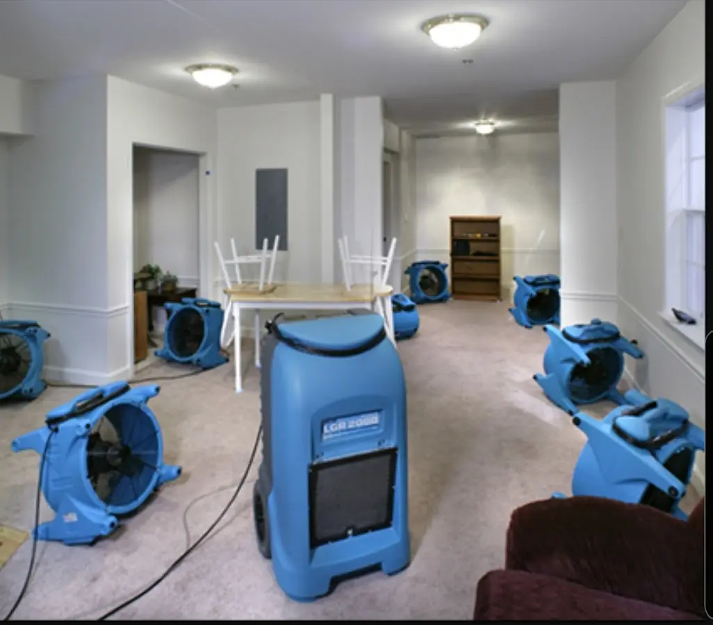 Air movers and dehumidifier setup for Water Damage Restoration in Tabernacle
